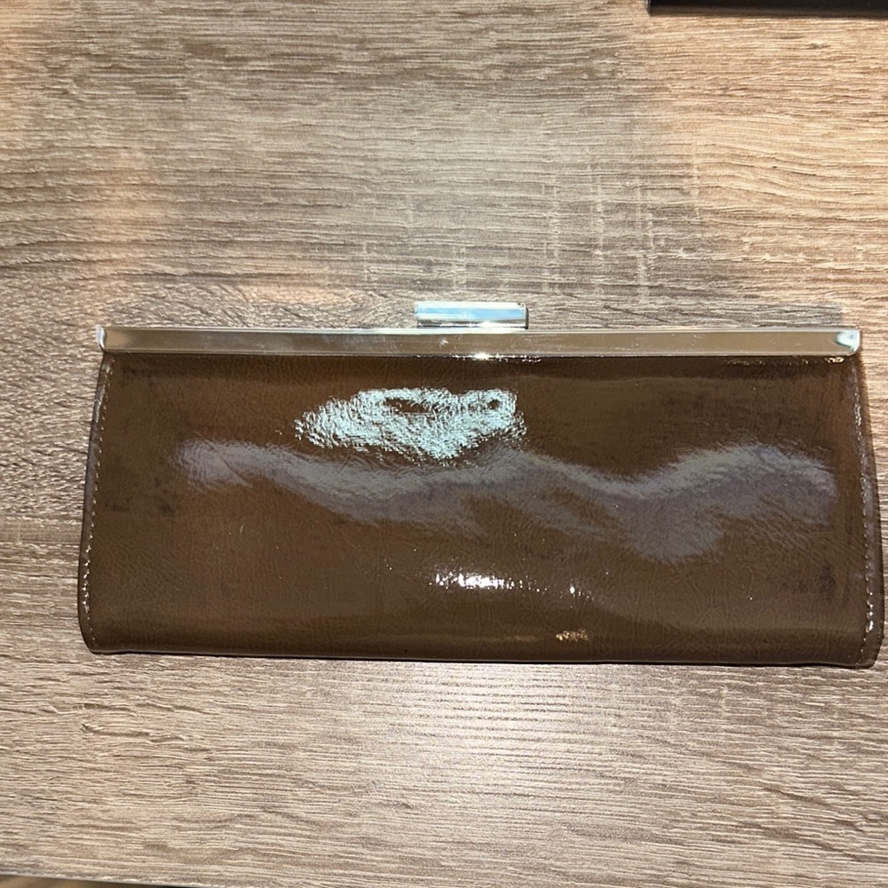 Sophisticated Brown Patent Leather Wristlet with Metallic Trim